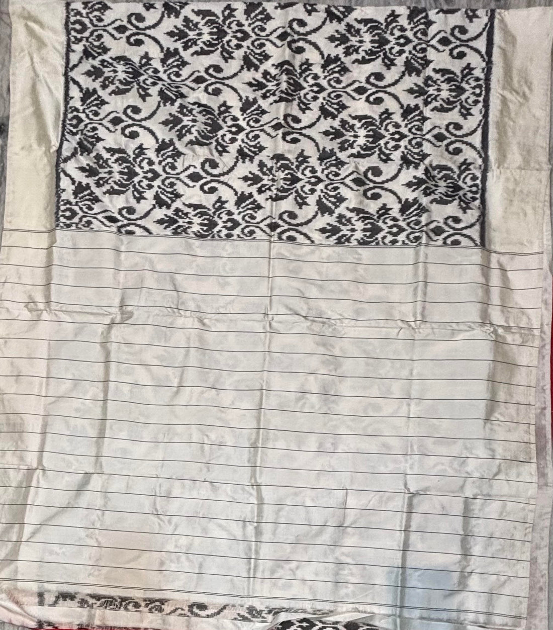 Elegant Off-White Ikat Silk Patola Saree with Contrast Red Blouse