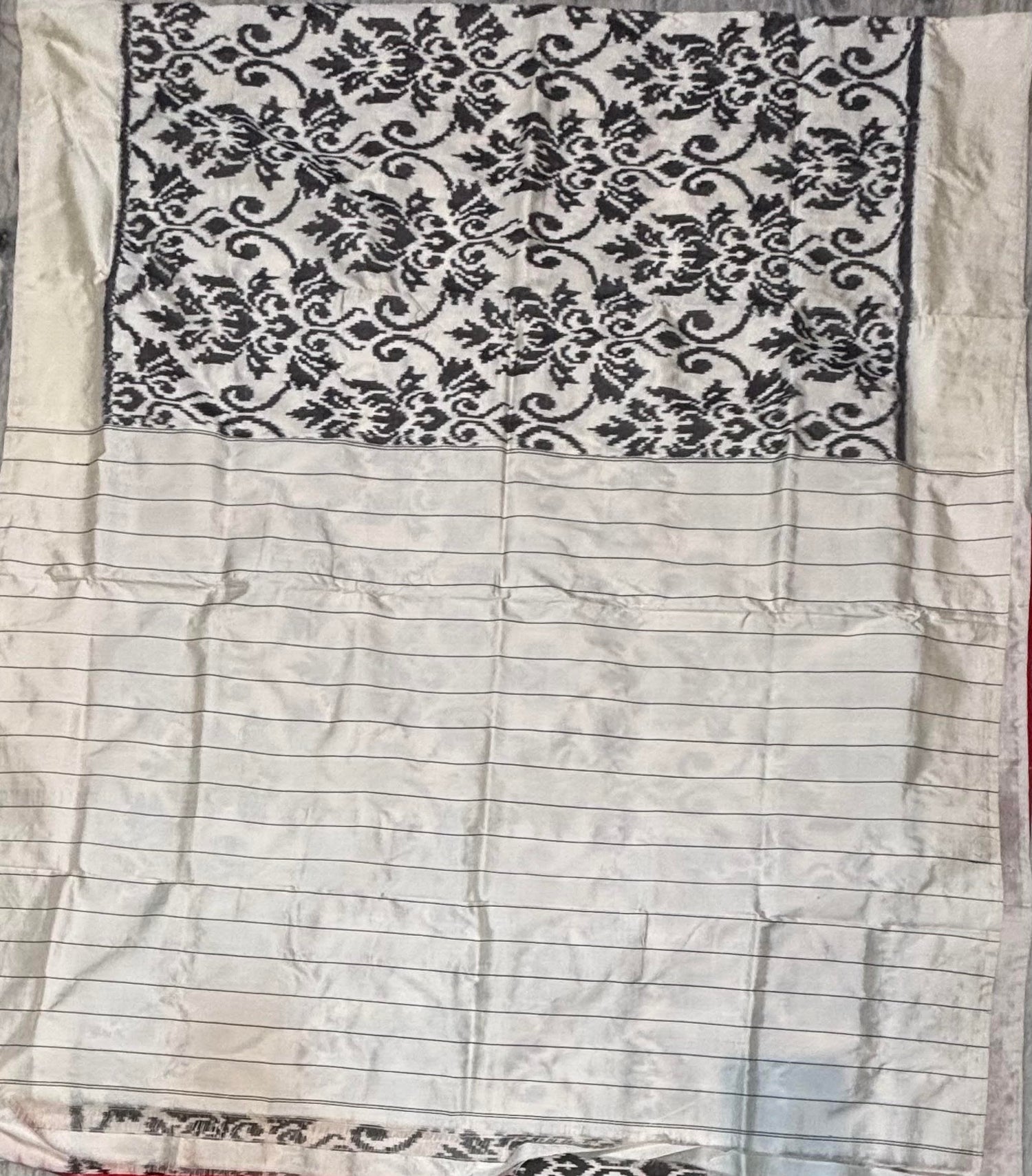 Elegant Off-White Ikat Silk Patola Saree with Contrast Red Blouse