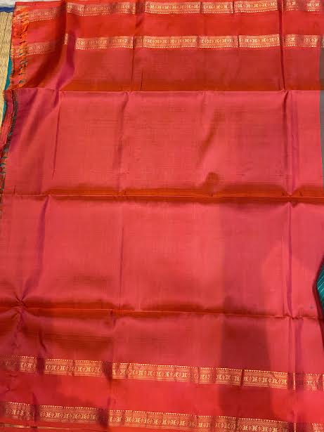 Silk Mark Certified Pure Kanchipuram Silk Saree in Teal Cyan with Contrast Red Zari Border